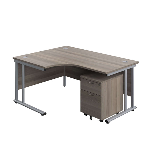 Twin Upright Left Hand Radial Desk + Mobile 2 Drawer Pedestal (FSC) | 1600X1200 | Grey Oak/Silver