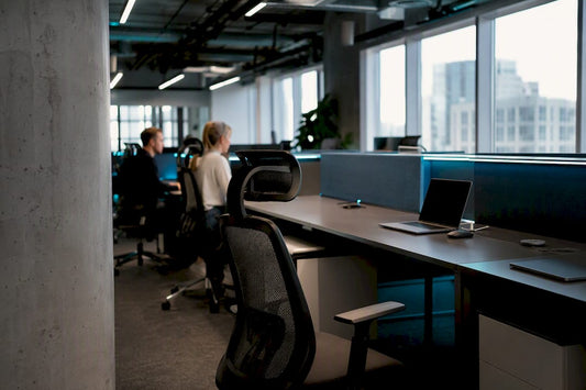 Collaborative workspace with ergonomic desks and chairs