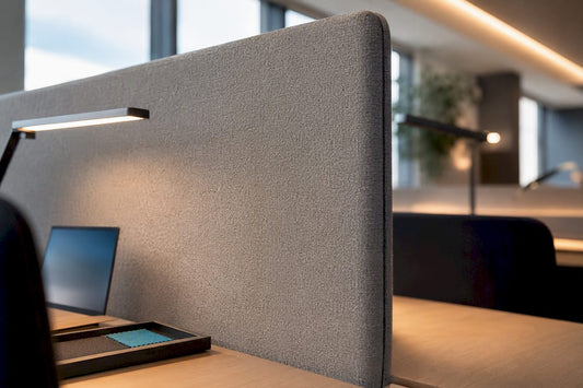 Fabric desk divider in open-plan office